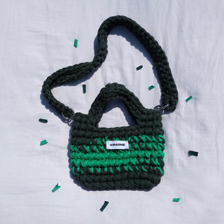 Green mini bag with a detachable crossbody strap