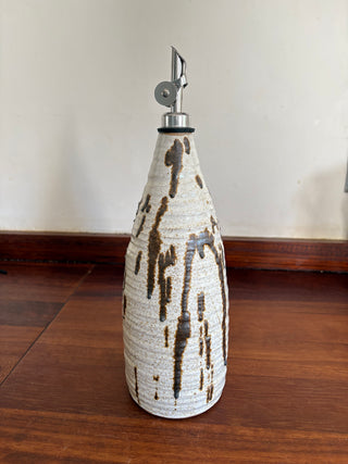 Large white speckle oil bottle
