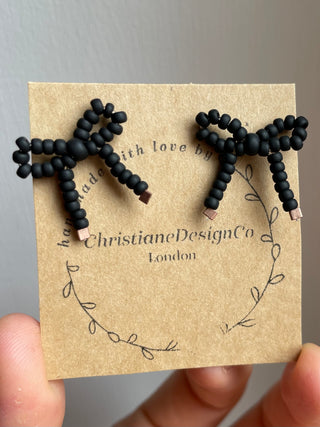 Coal matte black mini bow studded earrings
