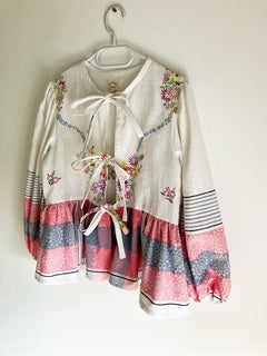 Pink Peplum Tie Blouse