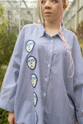 Upcycled blue & white striped shirt with Faces Patches
