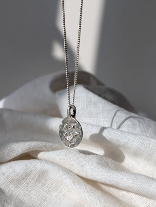 Sasta Two faced Smiley pendant necklace