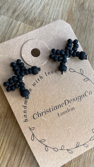 Coal black bow studded earrings