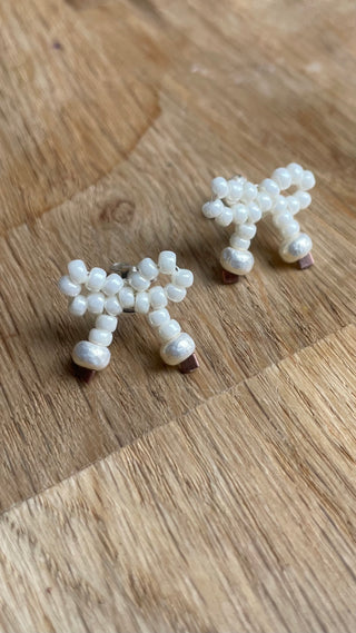 White pearl mini bow studded earrings